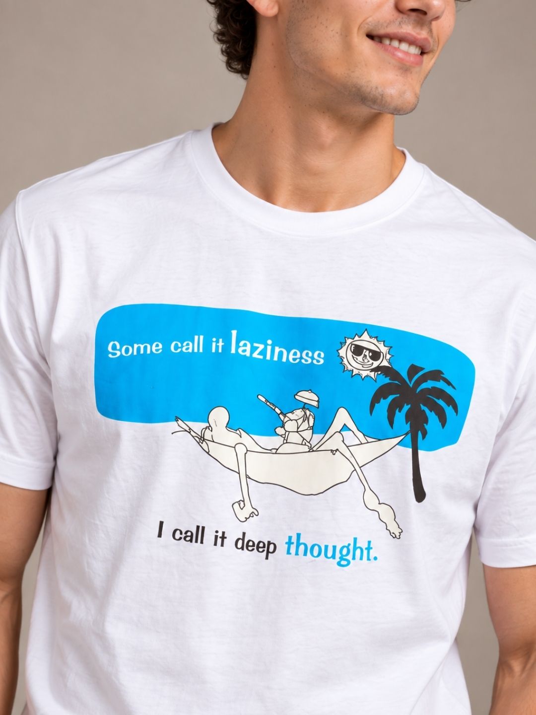 Some Call It Laziness, I Call It Deep Thought white t-shirt by Offbeat, close-up of the illustration