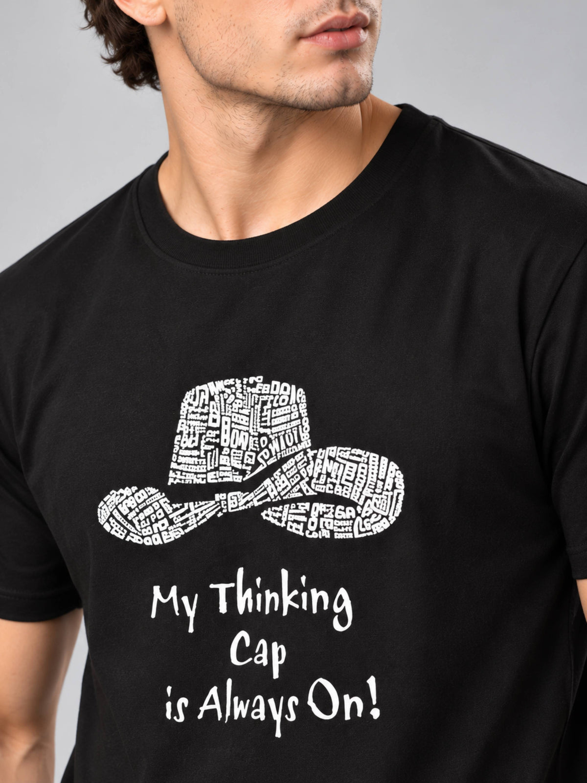 My Thinking Cap Is Always On black t-shirt by Offbeat, close-up of the illustration