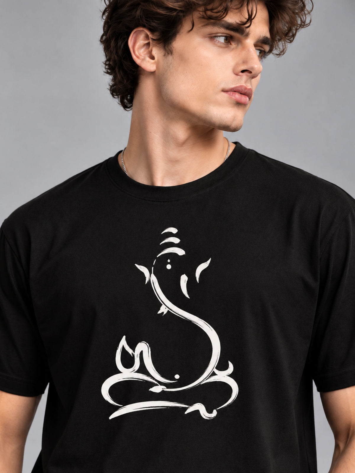Embossed Ganesha black t-shirt by Offbeat, close-up of the illustration