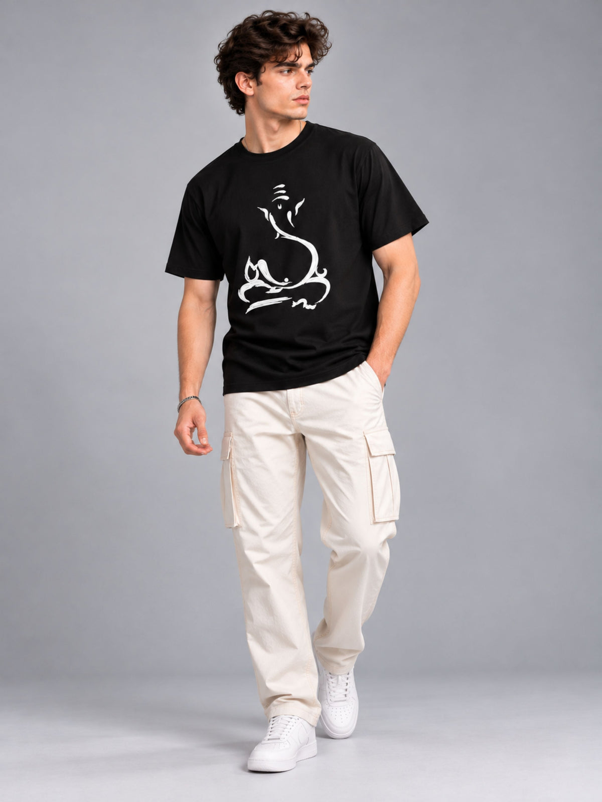 Embossed Ganesha black t-shirt by Offbeat, worn by a model